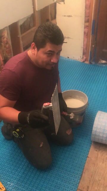 Cutting Uncoupling membrane over subfloor 2