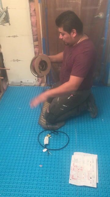 Installing Tempzone cable over uncoupling membrane